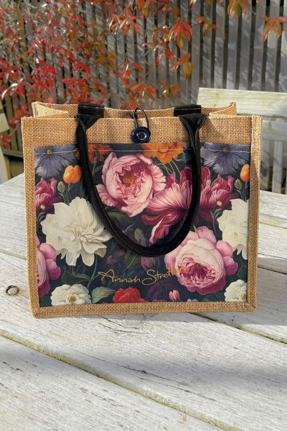 Midnight Waltz mini jute bag shown from the front with the button loop closure