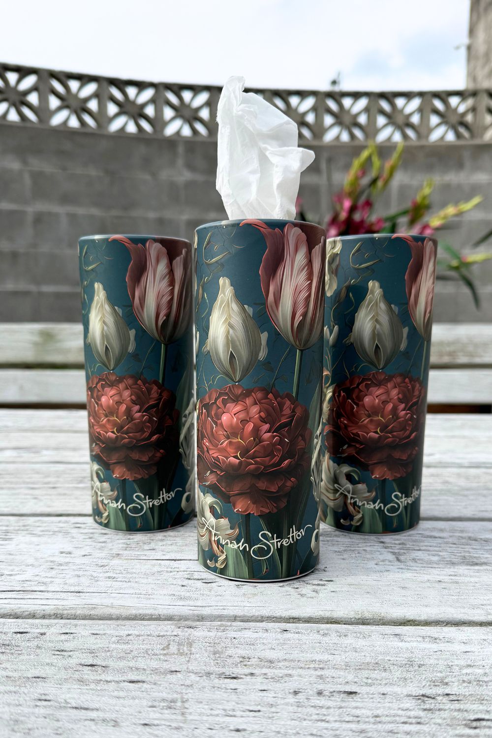 Three Annah Stretton Tulip Party refillable tissue cylinders standing side by side