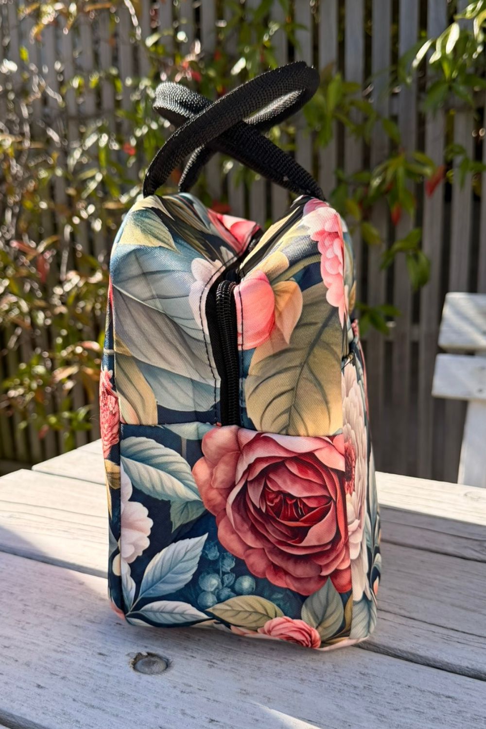 Side view of the Spring Serenade insulated bag showing the external pocket