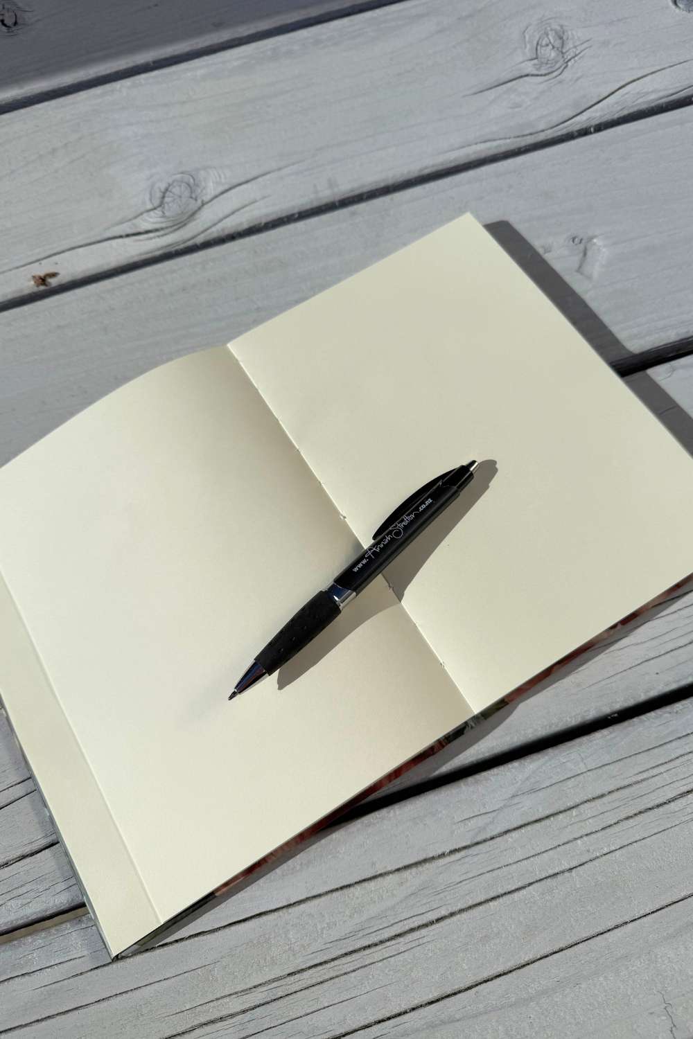 Romancing the Rose journal open to a blank page, ready for sketching or gratitude journaling